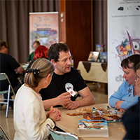 explication des règles d'un jeu sur un évènement au salon du jeu de société
